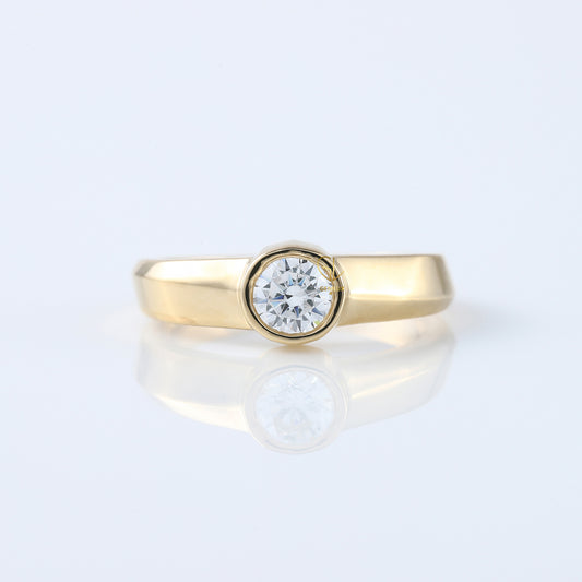 Bezel Set Round Moissanite Solitaire Yellow Gold Ring