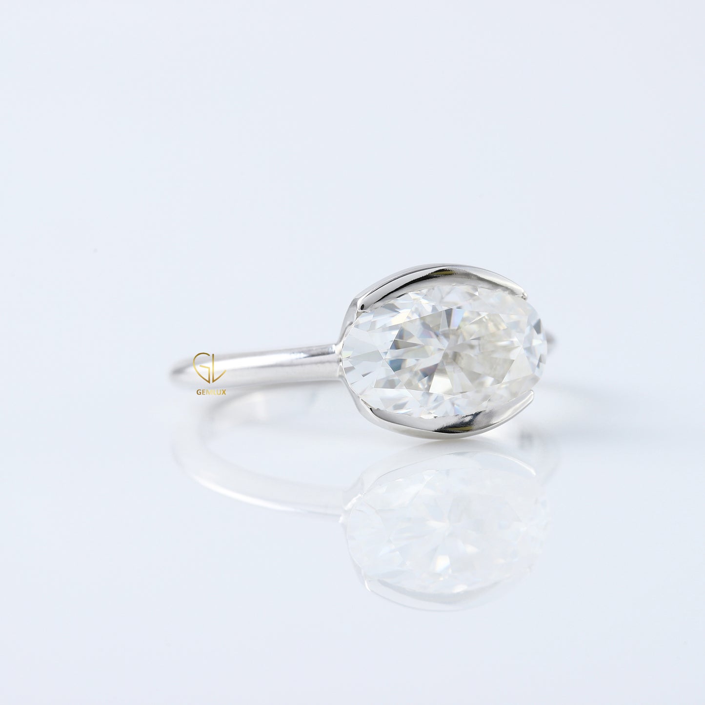 East West Oval Lab Grown Diamond Solitaire Ring - Half Bezel