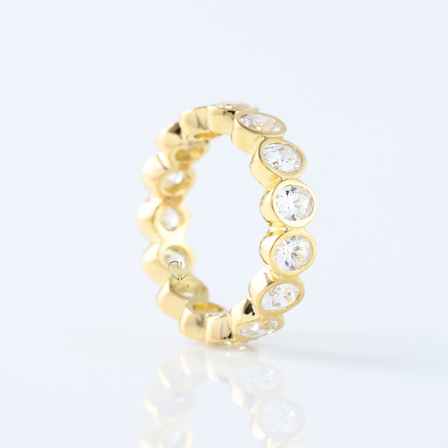 Oval Cut Lab Grown Diamond Bezel Set Eternity Wedding Band