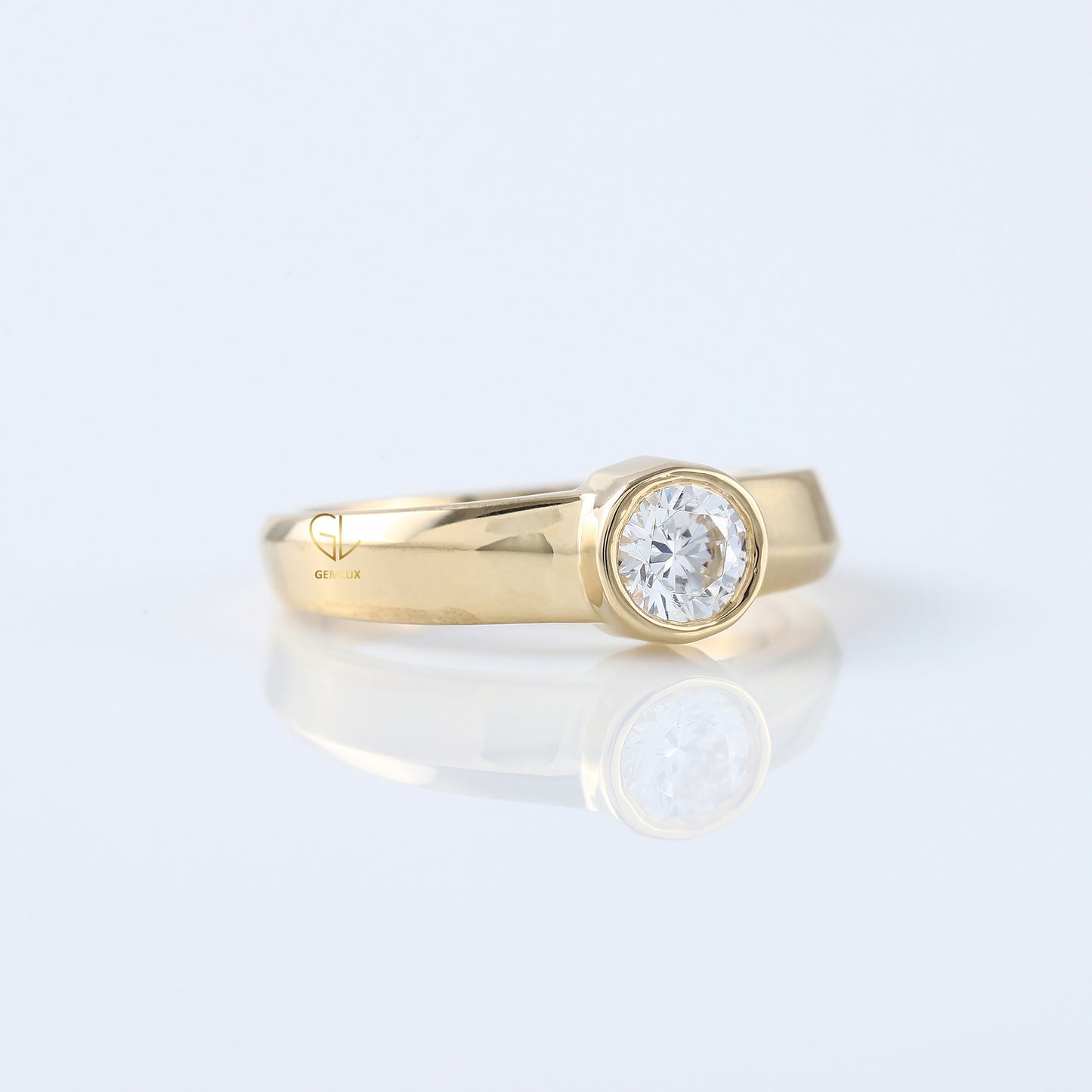 Bezel Set Round Moissanite Solitaire Yellow Gold Ring