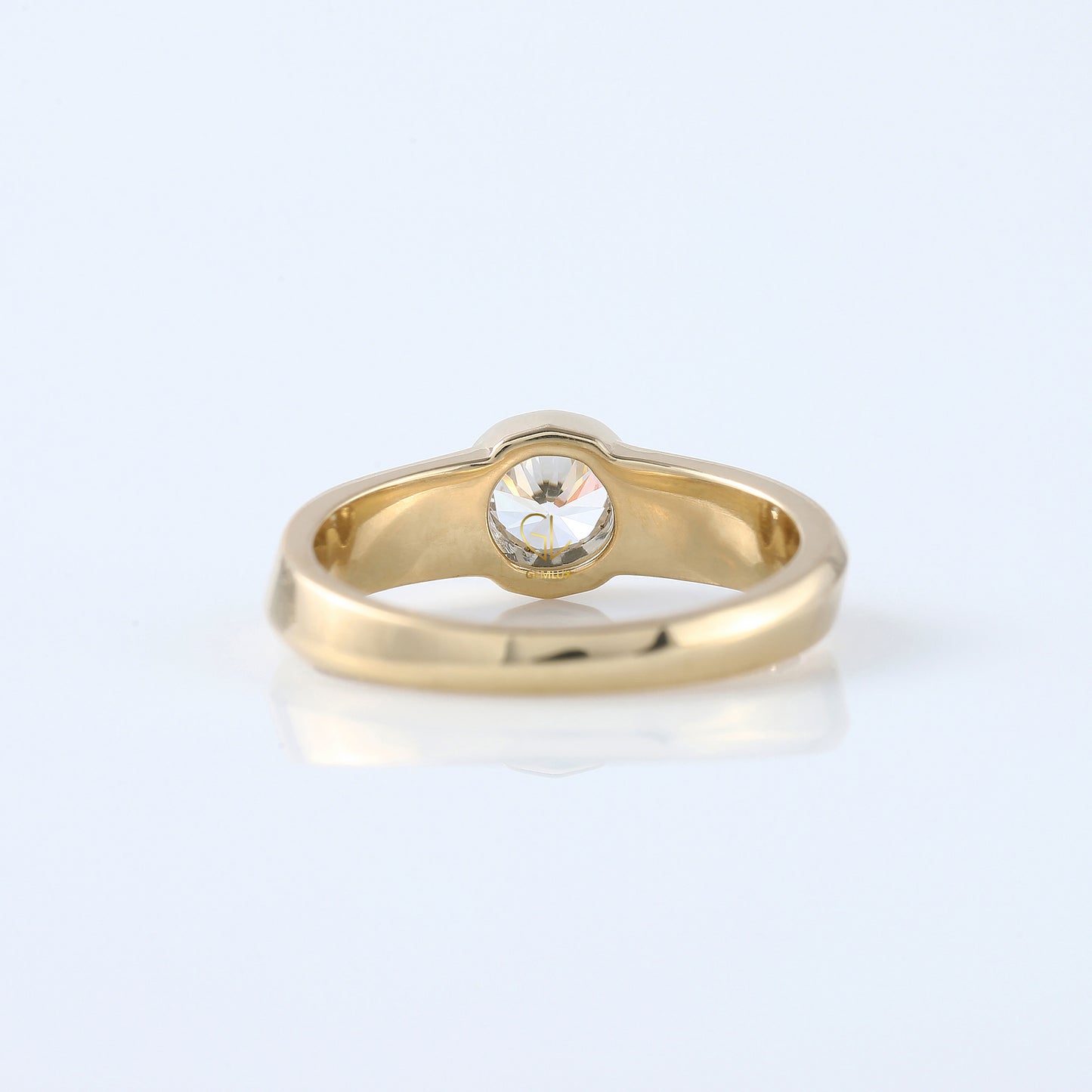Bezel Set Round Moissanite Solitaire Yellow Gold Ring