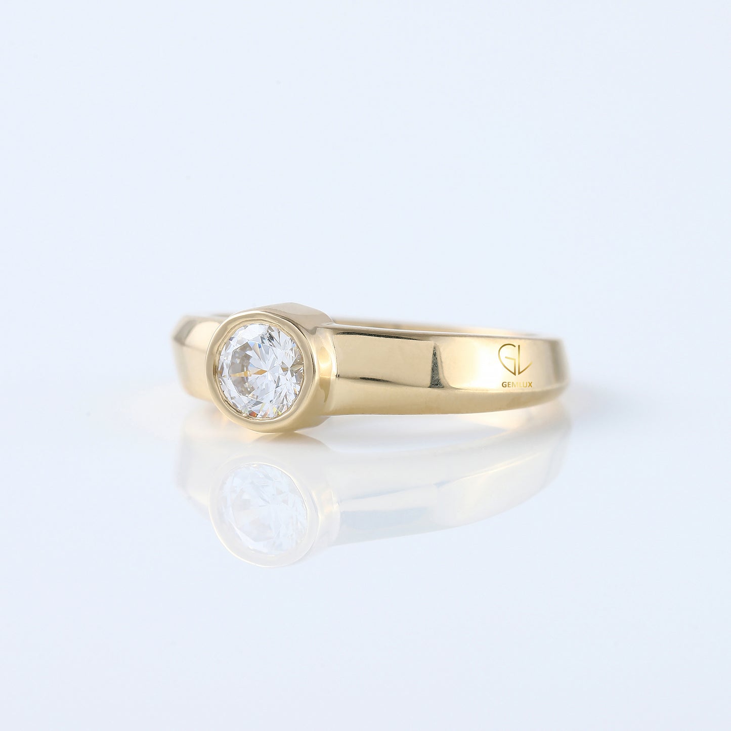 Bezel Set Round Moissanite Solitaire Yellow Gold Ring