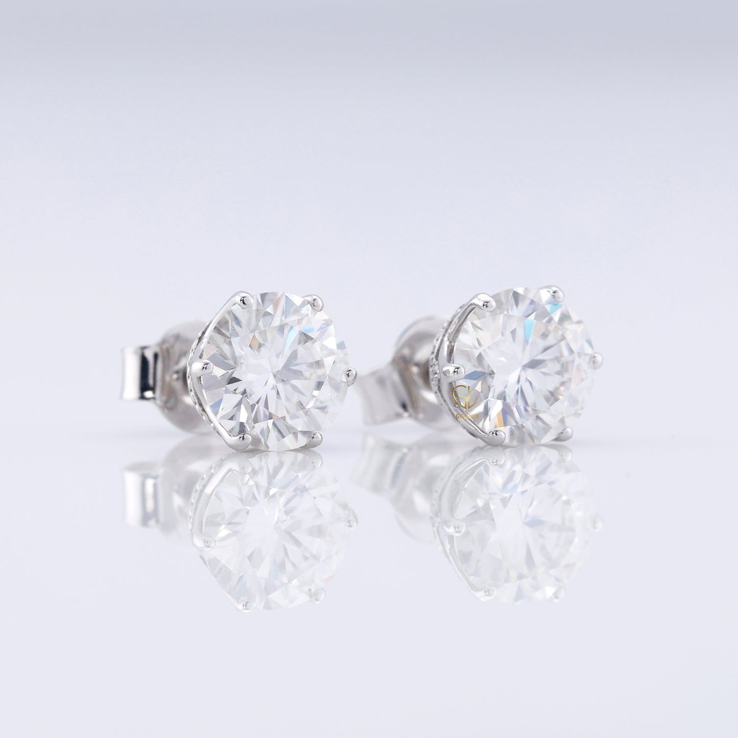 Round Cut Moissanite Stud Earrings - White Gold