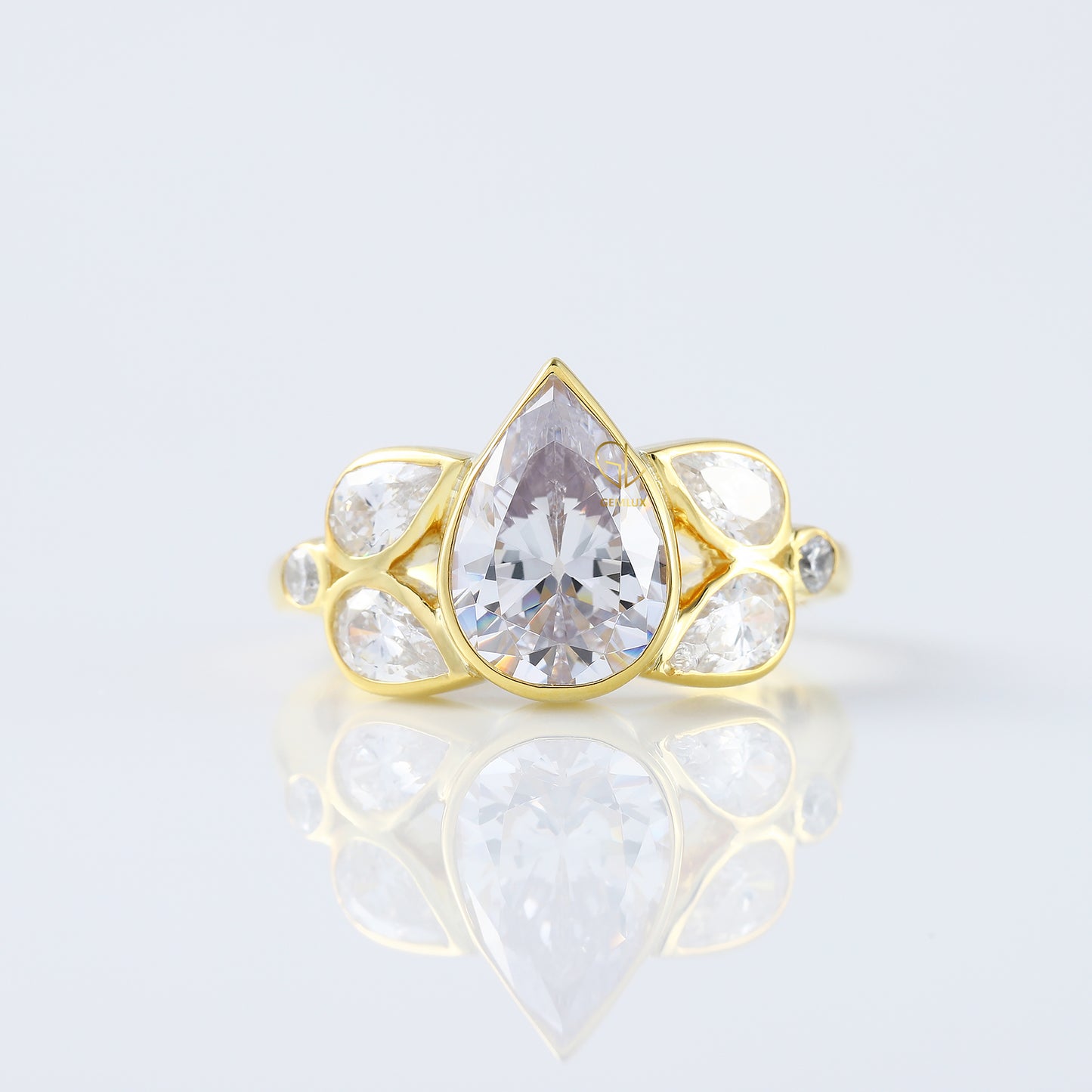 Seven Stone Pear Cut Moissanite Bezel Set Yellow Gold Ring