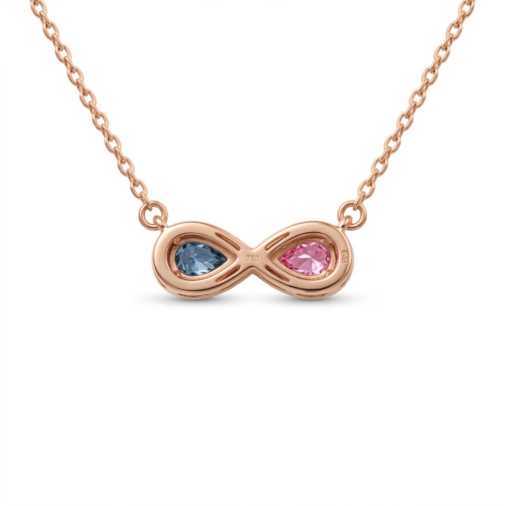 Discover a pink and blue pear-cut infinity pendant with smooth bezel settings. Personalize your gemstone pairing and metal with Gemlux Jewels.