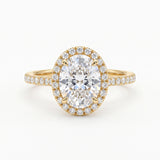 2 carat oval halo diamond engagement ring in 14K yellow gold with pavé diamond band