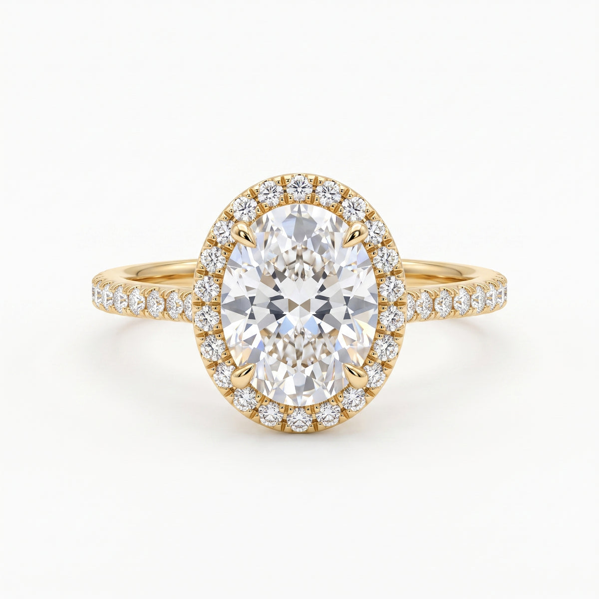2 carat oval halo diamond engagement ring in 14K yellow gold with pavé diamond band
