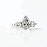 3 Ct Pear Cut Lab Grown Diamond Three Stone Ring