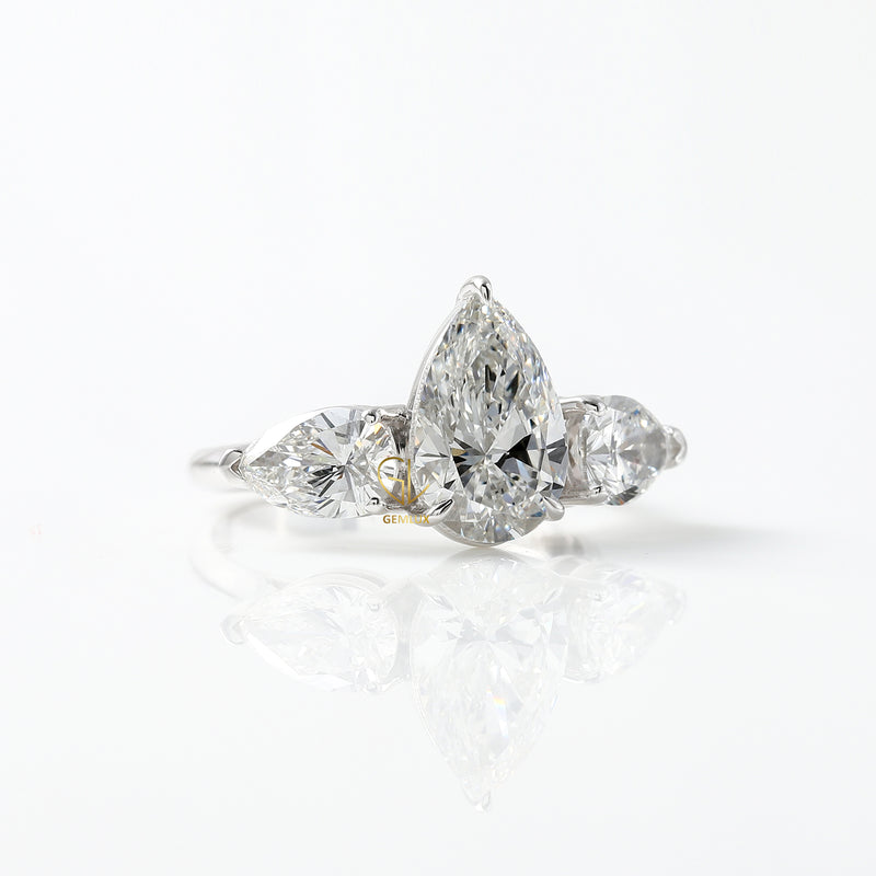 3 Ct Pear Cut Lab Grown Diamond Three Stone Ring