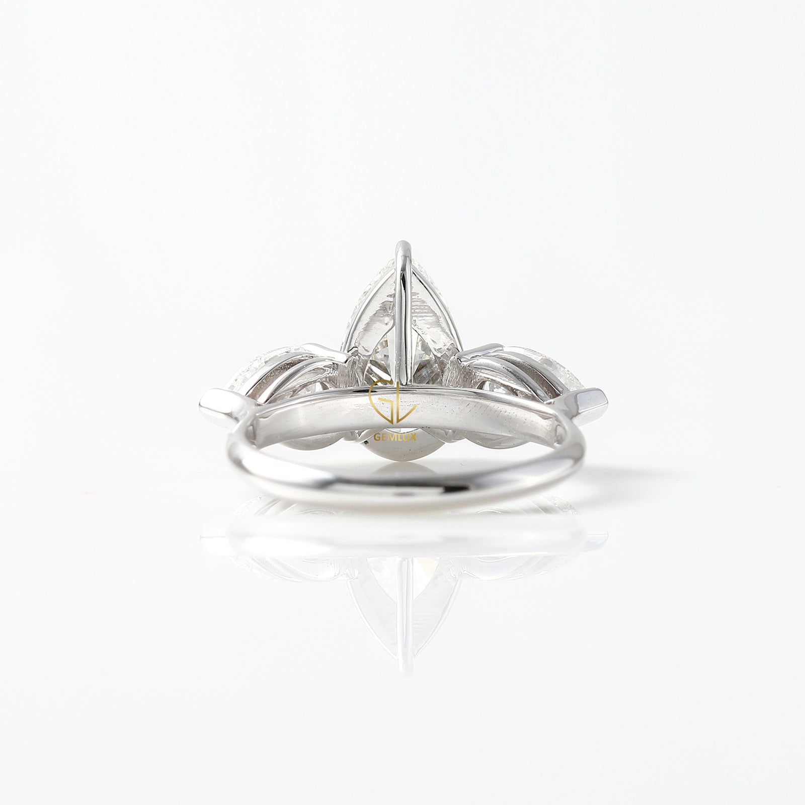3 Ct Pear Cut Lab Grown Diamond Three Stone Ring