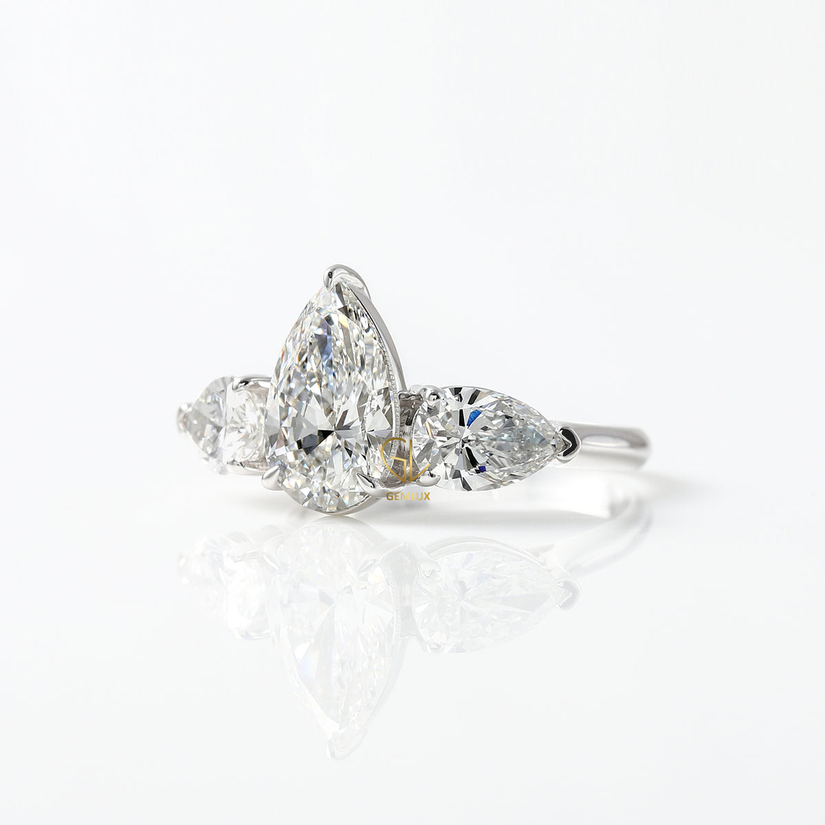 3 Ct Pear Cut Lab Grown Diamond Three Stone Ring