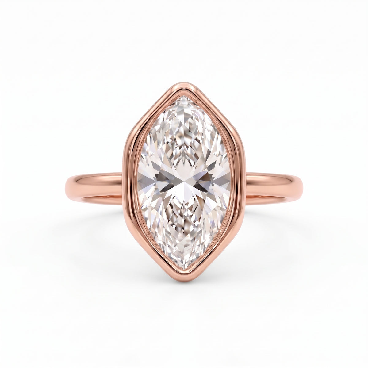 Marquise-cut lab-grown diamond bezel engagement ring with polished yellow-gold band