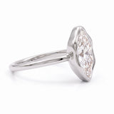 Marquise-cut lab-grown diamond bezel engagement ring with polished yellow-gold band