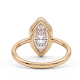 Marquise-cut lab-grown diamond bezel engagement ring with polished yellow-gold band