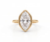 Marquise-cut lab-grown diamond bezel engagement ring with polished yellow-gold band