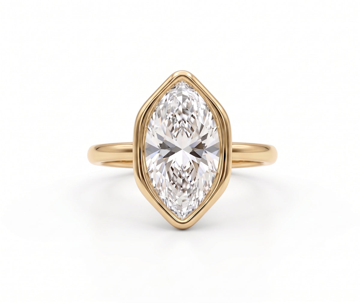 Marquise-cut lab-grown diamond bezel engagement ring with polished yellow-gold band