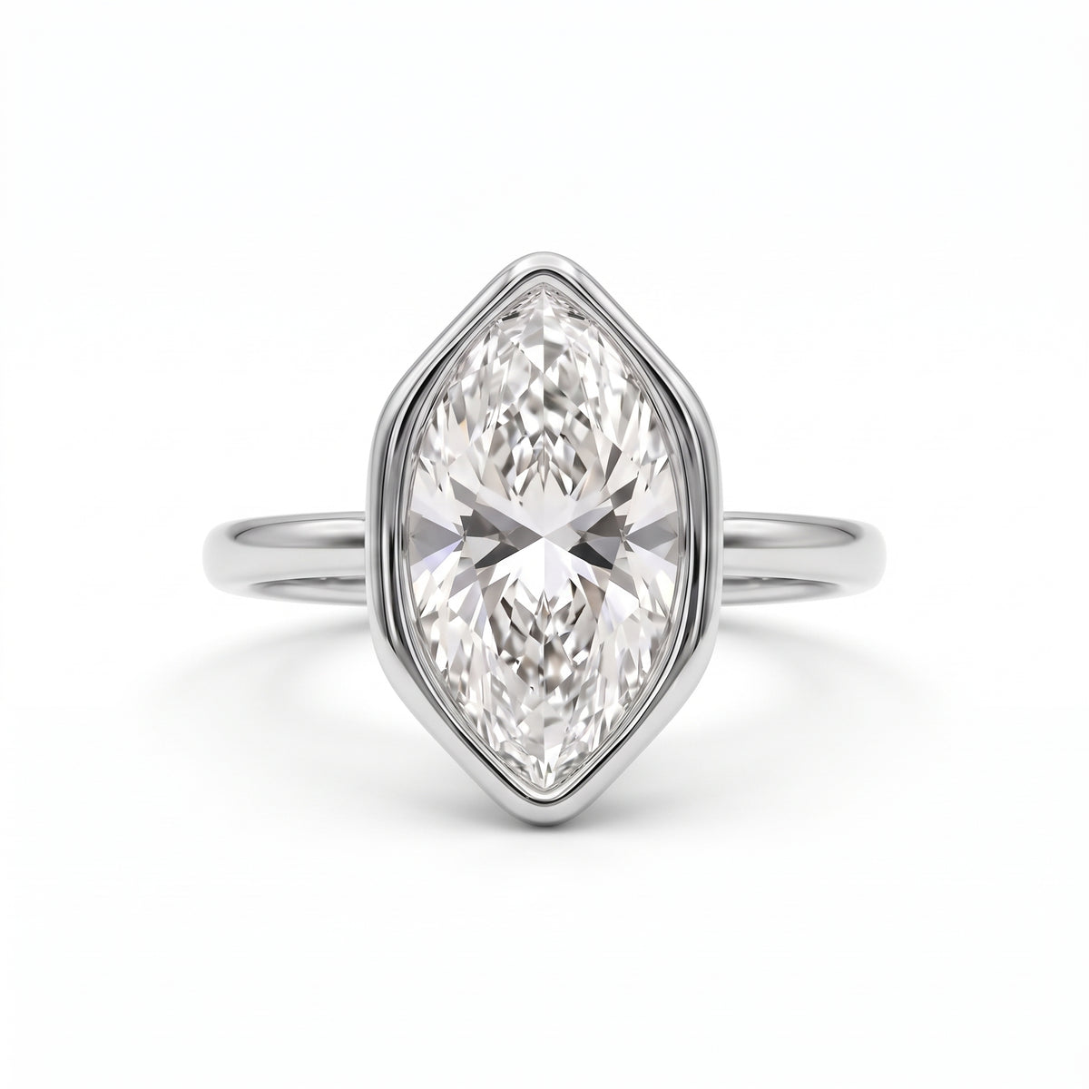 Marquise-cut lab-grown diamond bezel engagement ring with polished yellow-gold band