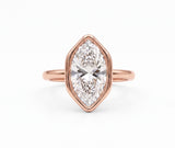 Marquise-cut lab-grown diamond bezel engagement ring with polished yellow-gold band