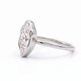 Marquise-cut lab-grown diamond bezel engagement ring with polished yellow-gold band