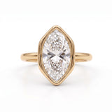 Marquise-cut lab-grown diamond bezel engagement ring with polished yellow-gold band