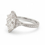 Art Deco marquise lab grown diamond engagement ring with engraved milgrain band and round side diamonds