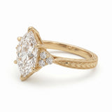 Art Deco marquise lab grown diamond engagement ring with engraved milgrain band and round side diamonds