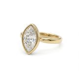Bezel marquise ring with lab grown diamond in yellow gold full bezel solitaire setting