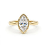 Bezel marquise ring with lab grown diamond in yellow gold full bezel solitaire setting