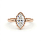 Bezel marquise ring with lab grown diamond in yellow gold full bezel solitaire setting