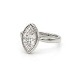 Bezel marquise ring with lab grown diamond in yellow gold full bezel solitaire setting