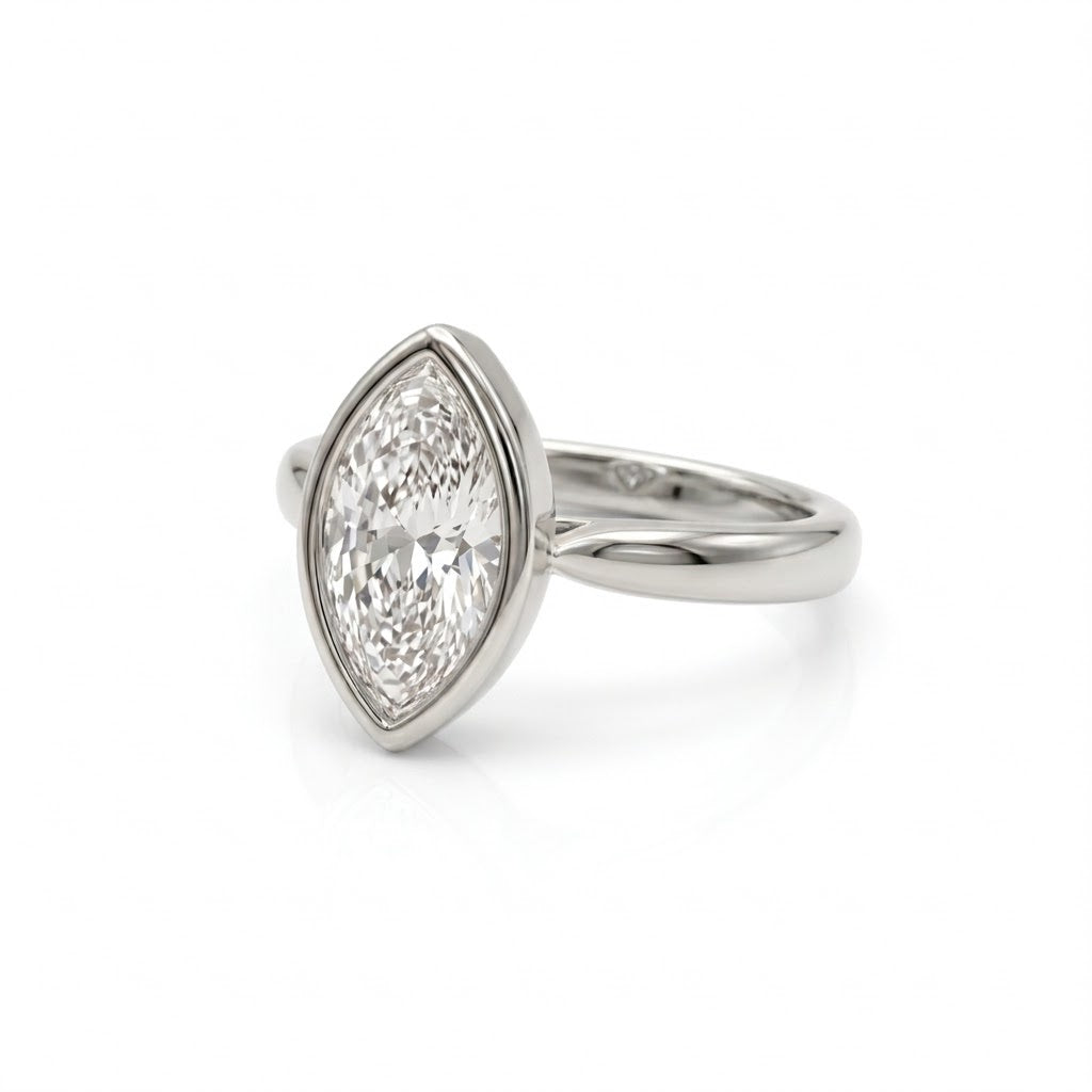 Bezel marquise ring with lab grown diamond in yellow gold full bezel solitaire setting