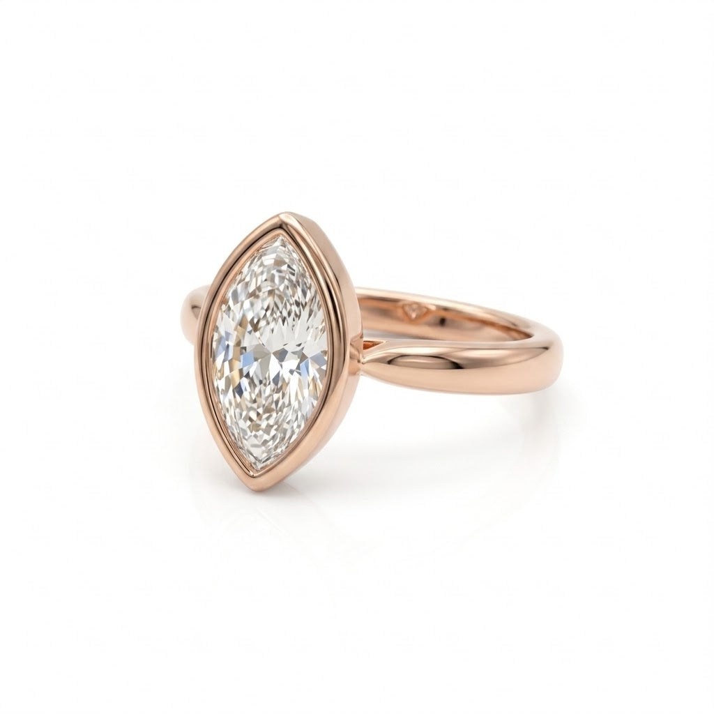 Bezel marquise ring with lab grown diamond in yellow gold full bezel solitaire setting