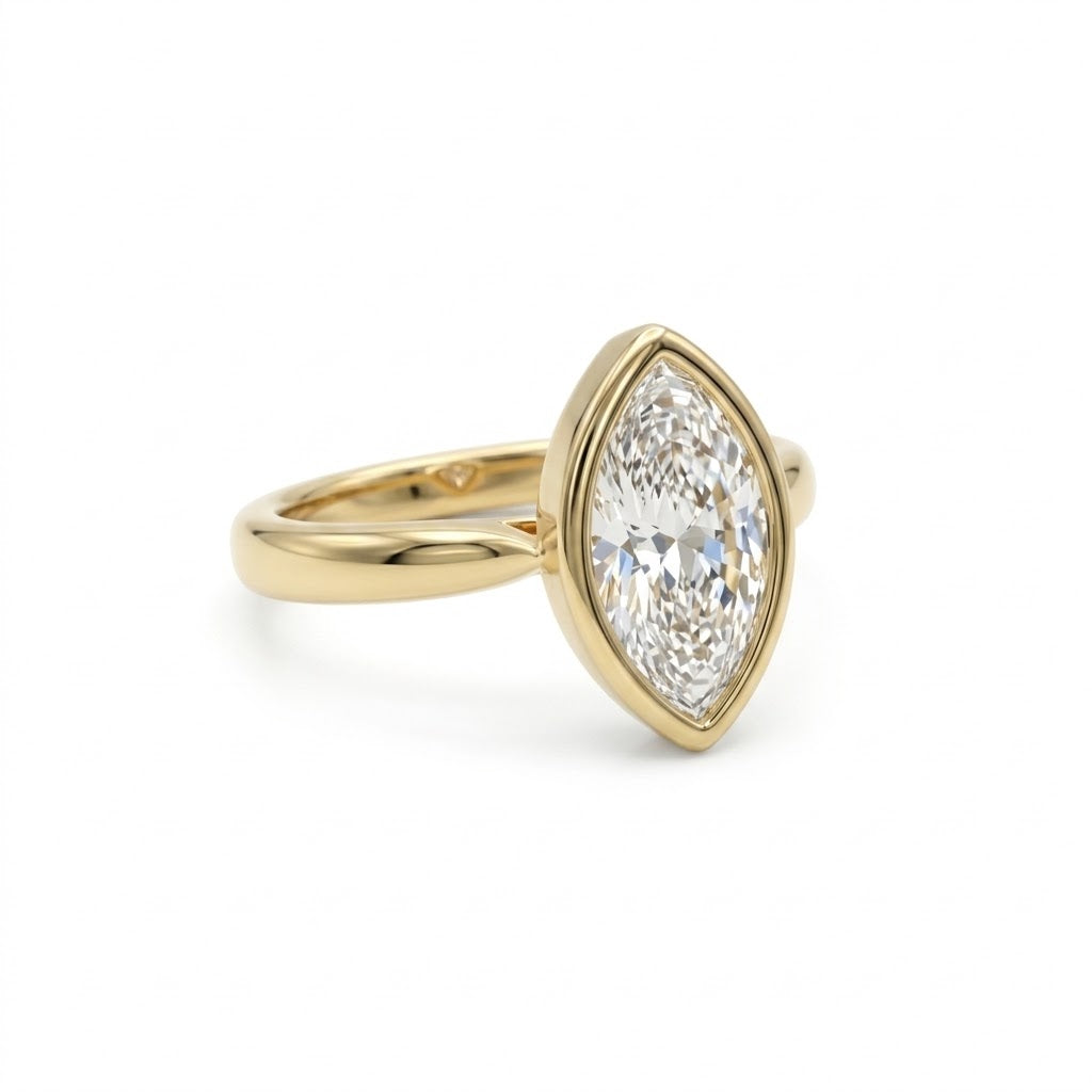 Bezel marquise ring with lab grown diamond in yellow gold full bezel solitaire setting