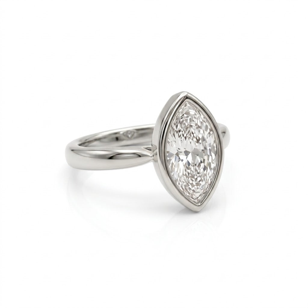 Bezel marquise ring with lab grown diamond in yellow gold full bezel solitaire setting