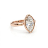 Bezel marquise ring with lab grown diamond in yellow gold full bezel solitaire setting