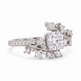 Cushion cut lab grown diamond floral vine engagement ring with marquise leaf accents in rose gold