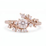 Cushion cut lab grown diamond floral vine engagement ring with marquise leaf accents in rose gold
