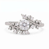 Cushion cut lab grown diamond floral vine engagement ring with marquise leaf accents in rose gold