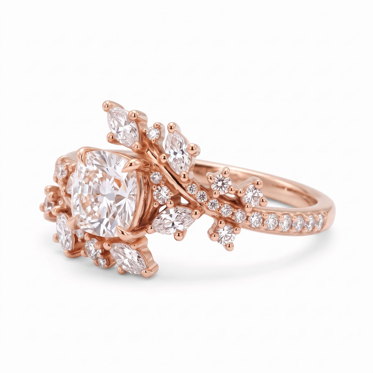 Cushion cut lab grown diamond floral vine engagement ring with marquise leaf accents in rose gold