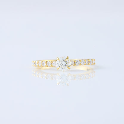 Delicate Round Cut Moissanite Solitaire With Accent Engagement Ring