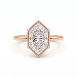 Dutch marquise-cut lab-grown diamond solitaire engagement ring with a six-claw framed setting and polished yellow-gold band.