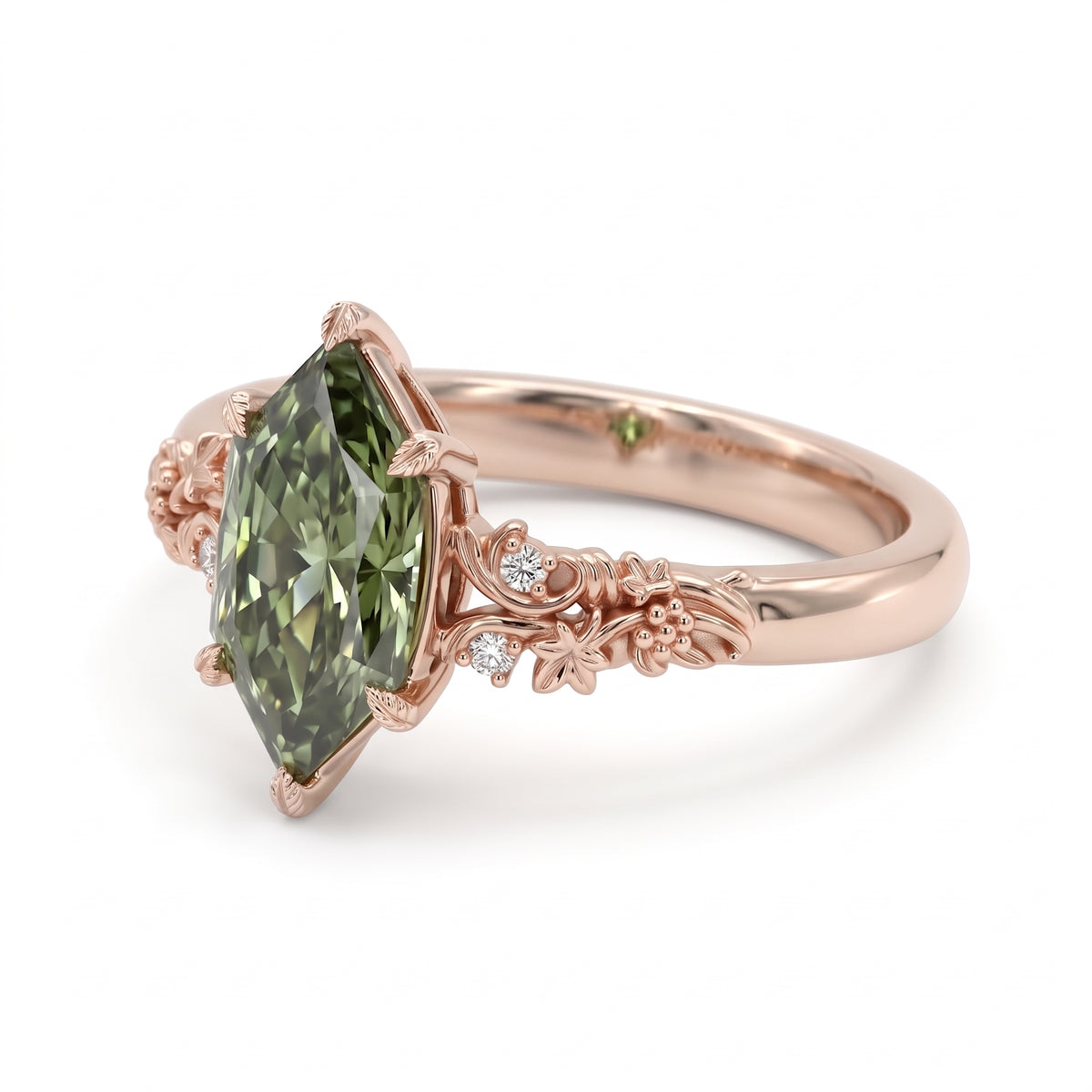 Fancy green marquise-cut lab-grown diamond engagement ring with a vintage gold vine band and round diamond accents