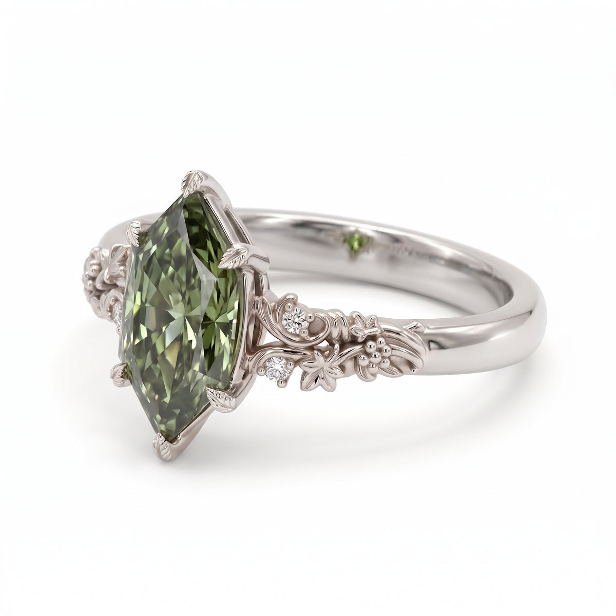 Fancy green marquise-cut lab-grown diamond engagement ring with a vintage gold vine band and round diamond accents