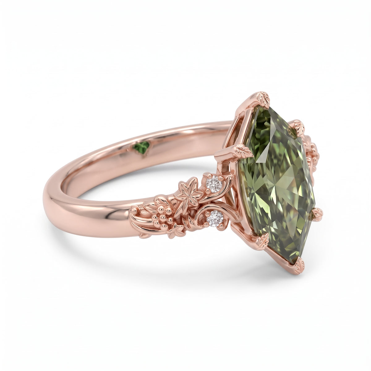 Fancy green marquise-cut lab-grown diamond engagement ring with a vintage gold vine band and round diamond accents