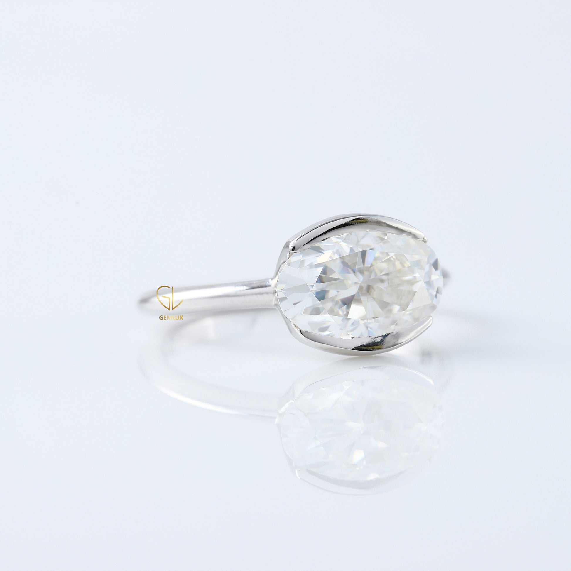 East West Oval Lab Grown Diamond Solitaire Ring - Half Bezel
