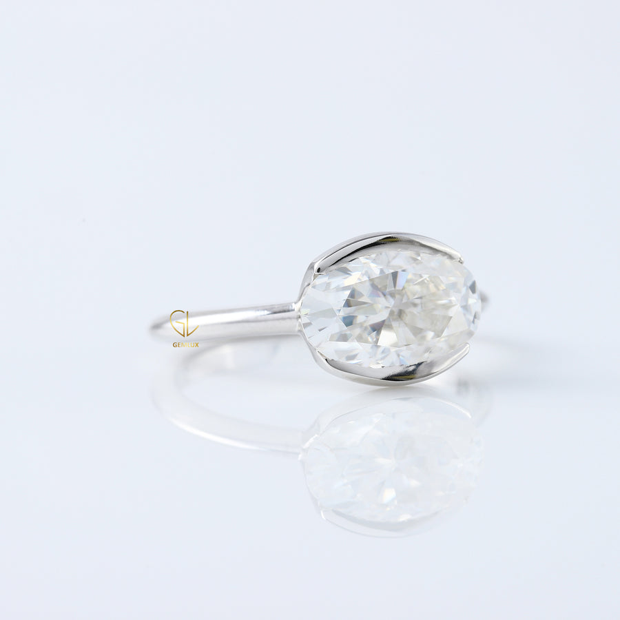 East West Oval Lab Grown Diamond Solitaire Ring - Half Bezel