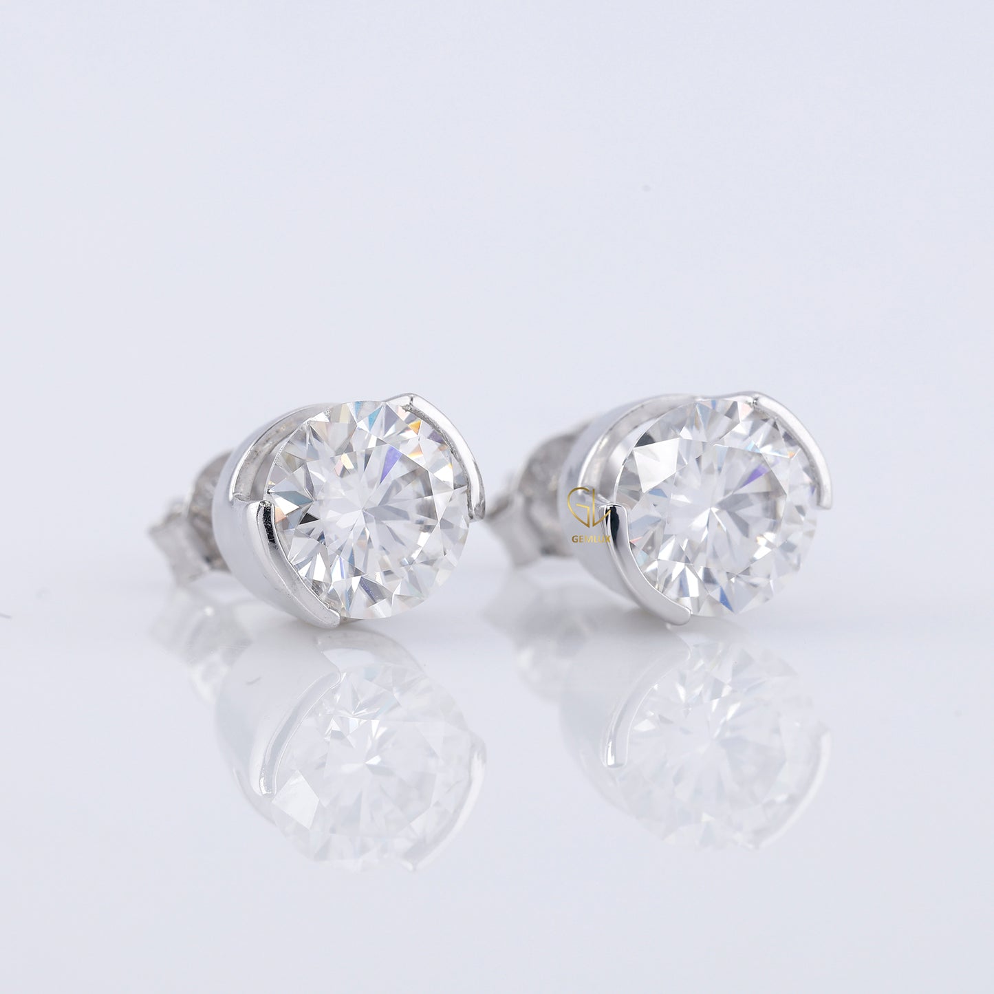 Half Bezel Set Round Moissanite Stud Earrings