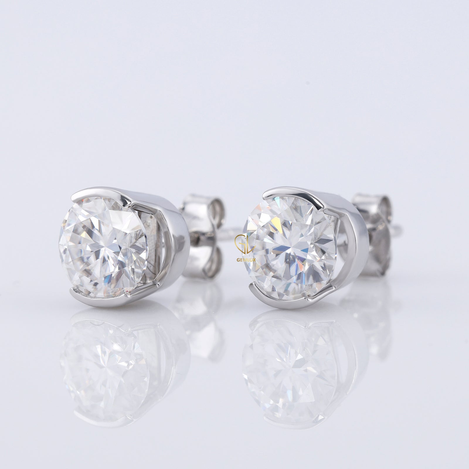 Half Bezel Set Round Moissanite Stud Earrings