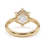 Hexagon step-cut lab-grown diamond solitaire engagement ring with a six-prong setting and polished yellow-gold band.