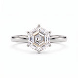 Hexagon step-cut lab-grown diamond solitaire engagement ring with a six-prong setting and polished yellow-gold band.